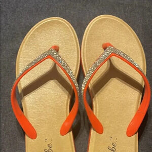 3/$30 Woman’s rhinestone flip flops
